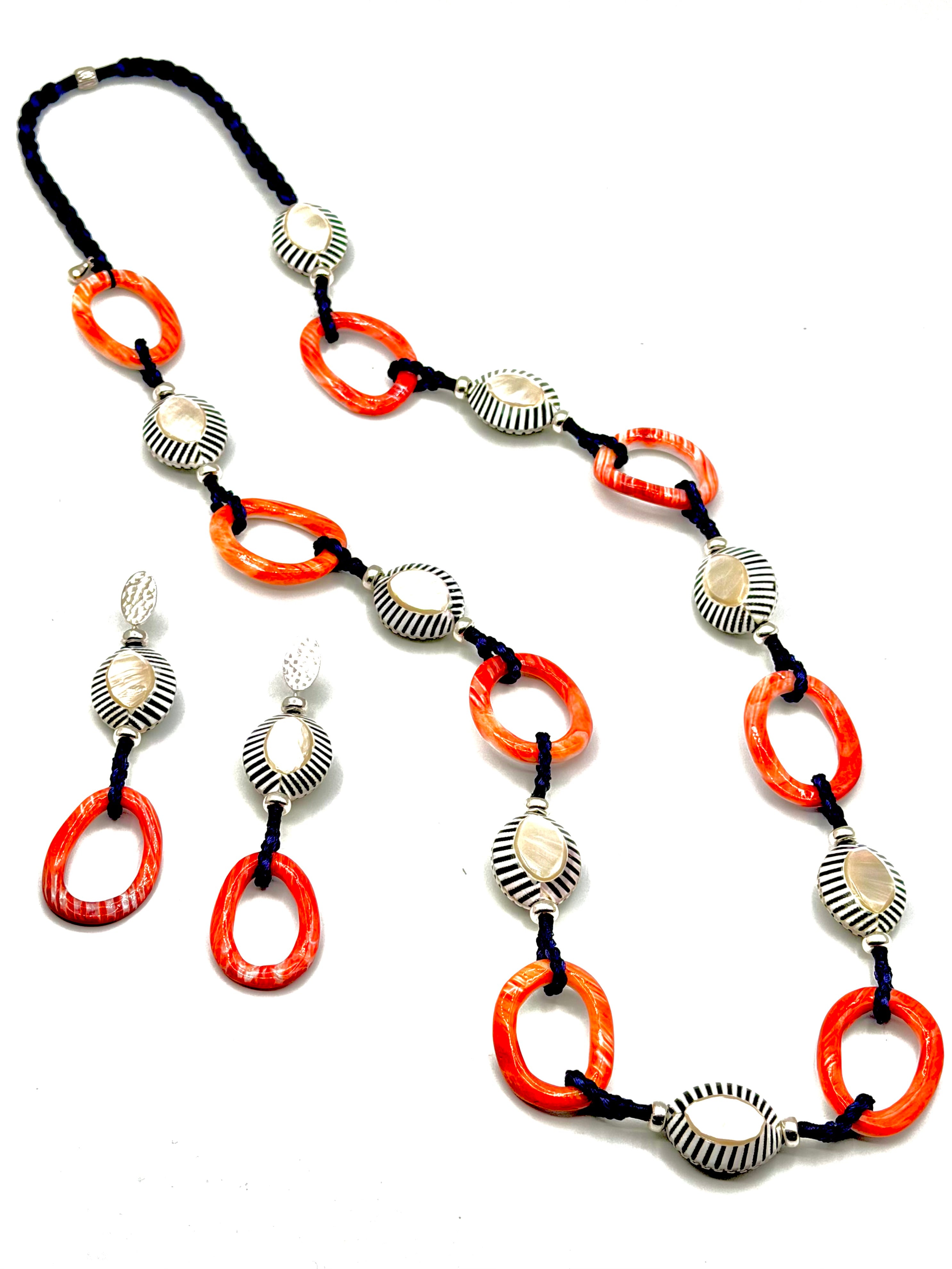 #1 Sunset Meets the Sea - Orange Sea Shell oval Rings , Stripped Mother of Pearl and Signature Handwoven Navy Blue Silk Loops