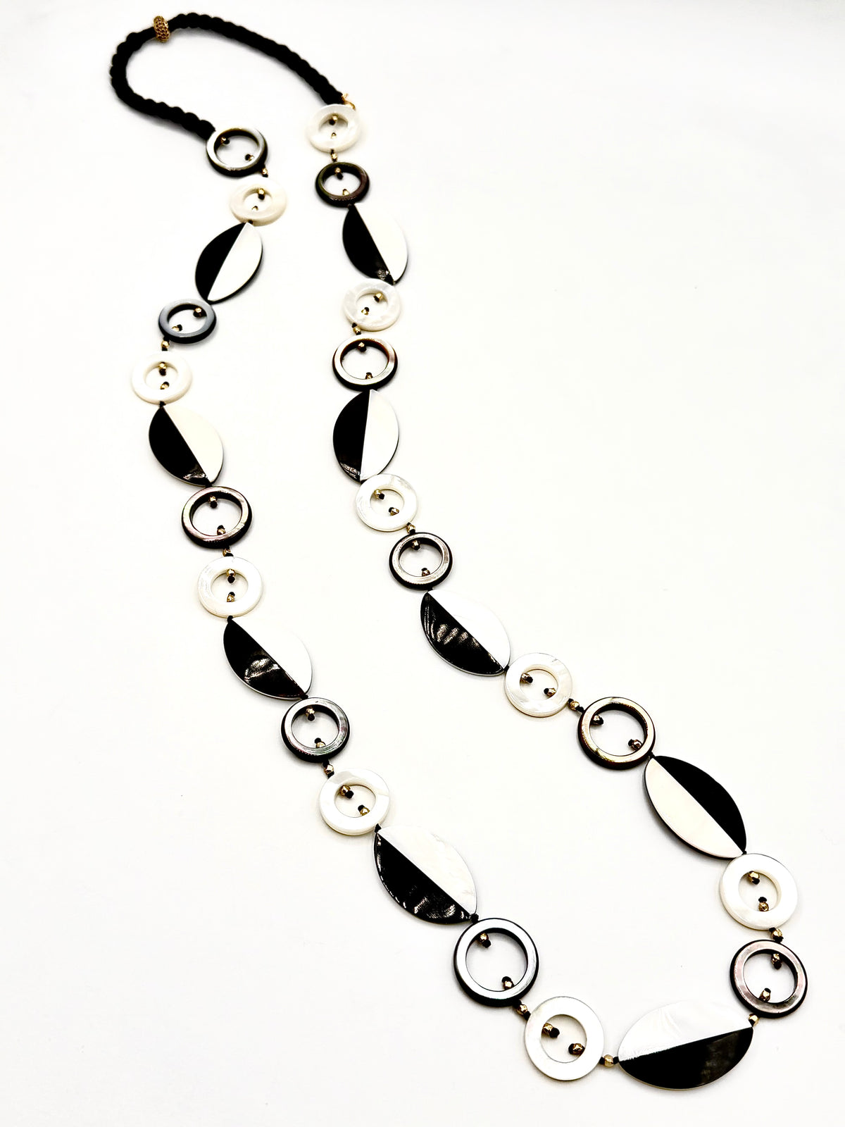 # 1  Contemporary Geometry in Black & White - A luminous play of circles ,ovals & mother of pearls