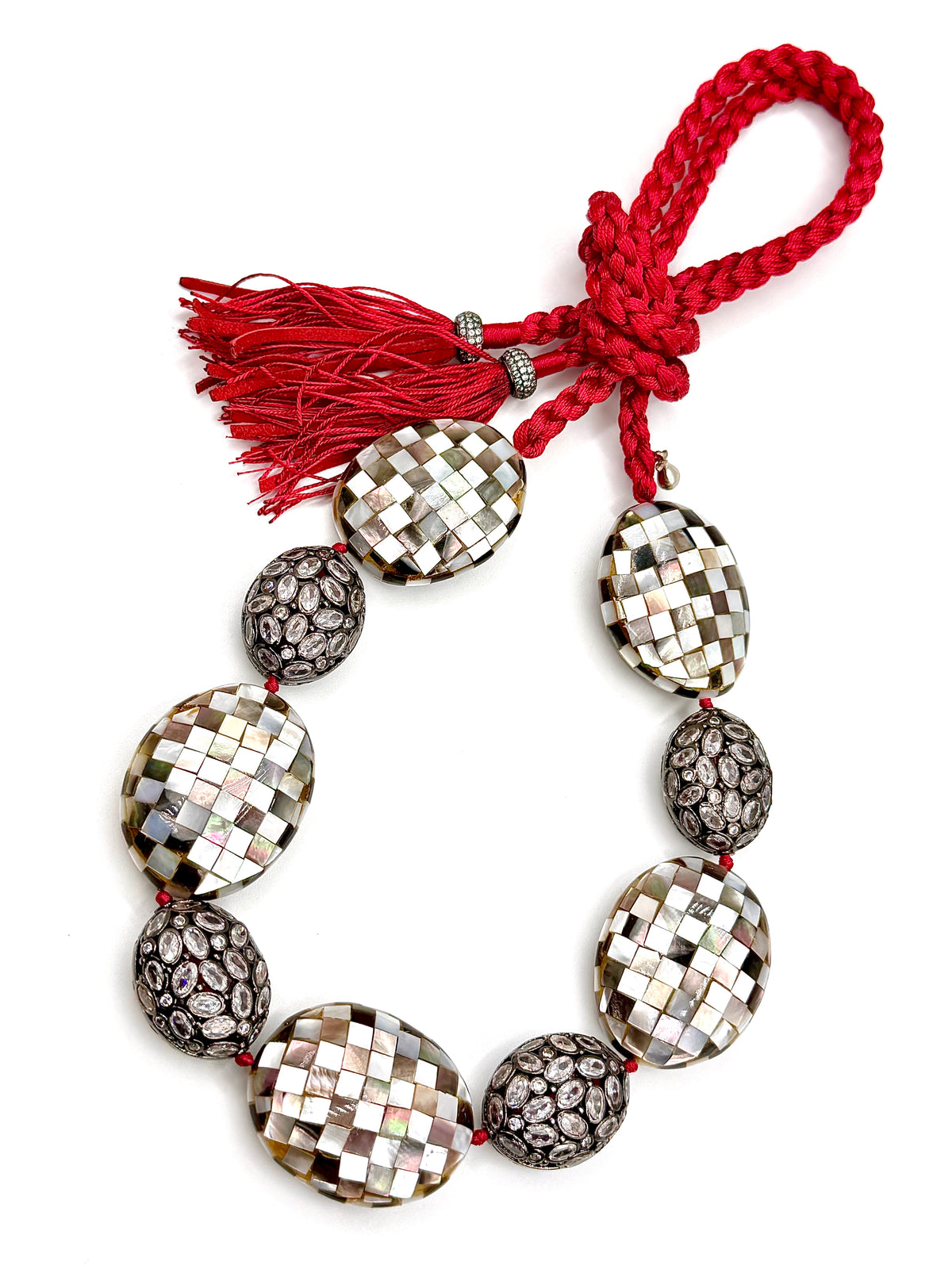 # 63 Mosaic Mother of Pearl in a Striking Oval Beads , Pave Inlaid Glass Faceted Beads and Hand Woven Red Silk that ties the whole piece together !