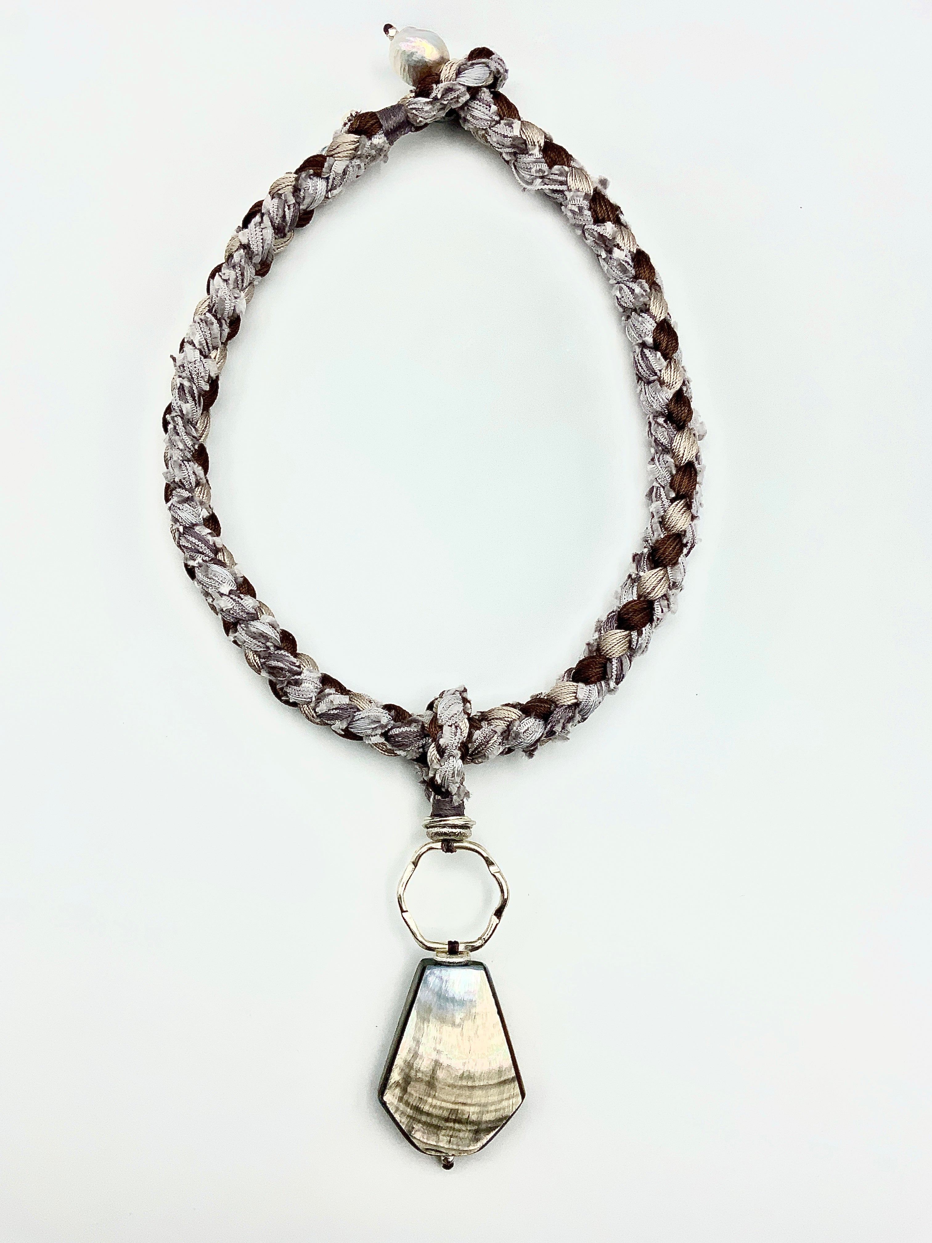 # 47 Hand Woven Silks Cord Choker & Mother of Pearl Pendant