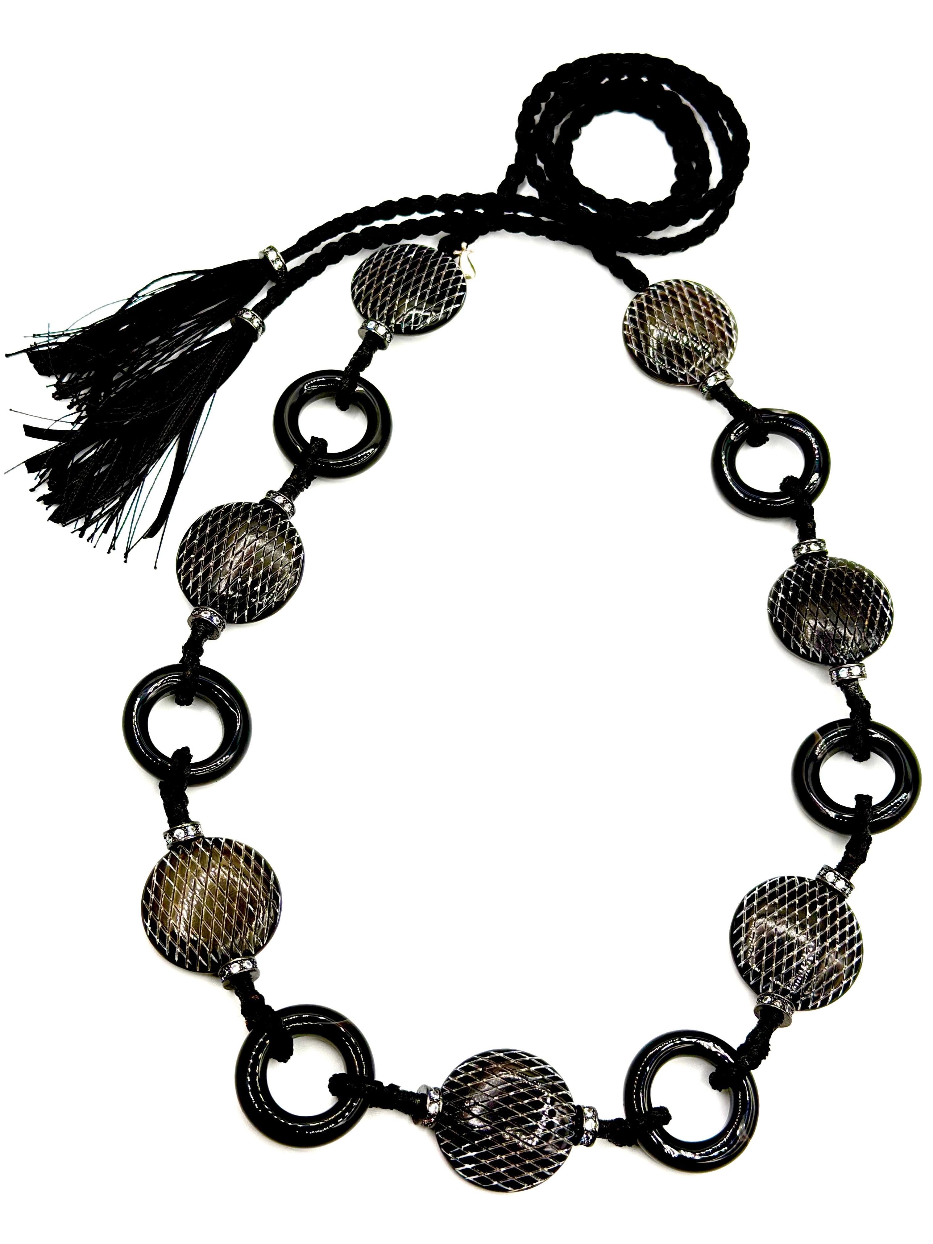 # 1 Black Onix Round Rings & Horn Textured Puff Coins